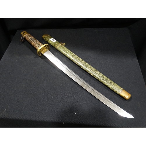 94 - A Japanese 1st World War Wakizashi With Green Leather Sheath