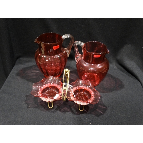 70 - Two Cranberry Glass Water Jugs, Together With A Cranberry Glass Serving Dish