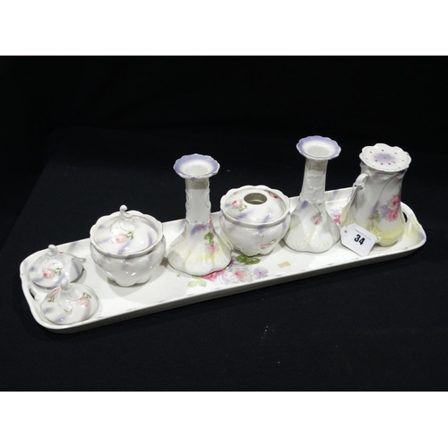 34 - An Edwardian Porcelain Dressing Table Set