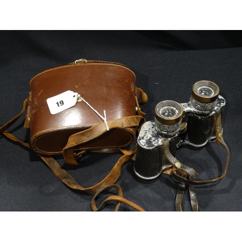 19 - A Pair Of Vintage Binoculars In A Stitched Leather Case