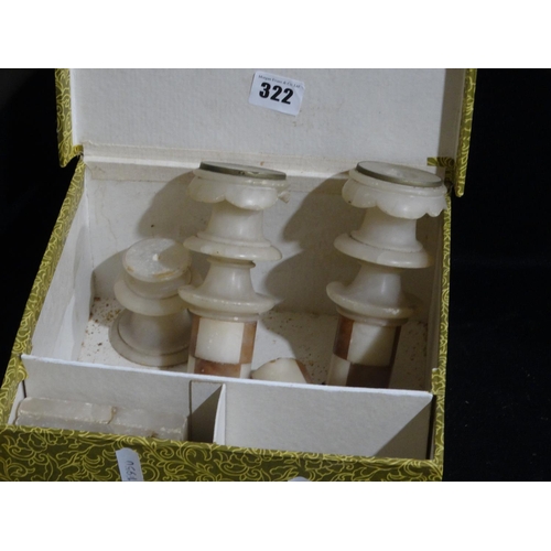 A Pair Of Sectional Alabaster Candle Sticks