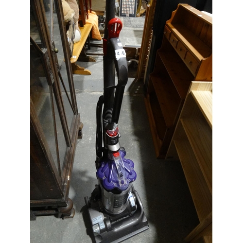 A Dyson Upright Vacuum Cleaner