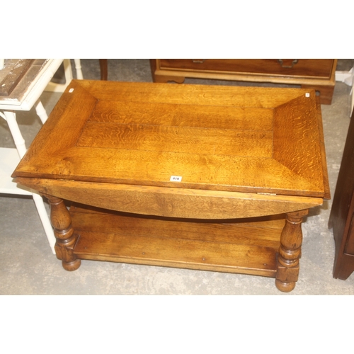 An Antique Style Oak Coffee Table With Drop Sides