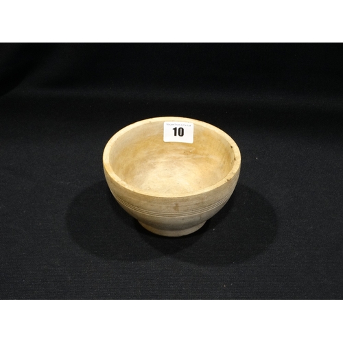 10 - An Antique Sycamore Circular Cereal Bowl