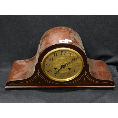 81 - An Edwardian Polished Mantel Clock With Circular Silvered Dial