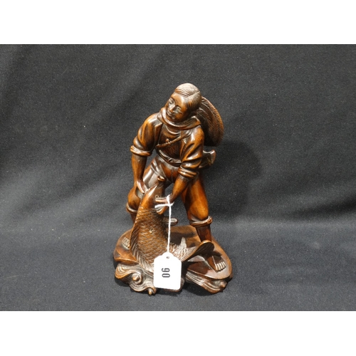 90 - A Well Carved Hardwood Figure Of An Oriental Fisherman & His Catch