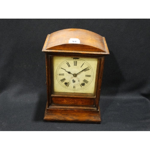 91 - An Edwardian Oak Encased Mantel Clock