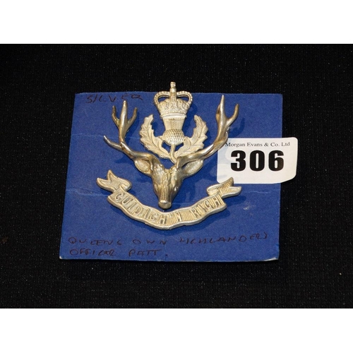 306 - A Silver Queen`s Own Highlanders Cap Badge