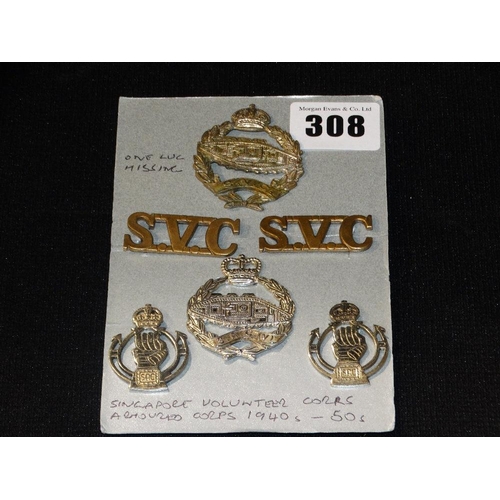 308 - A Group Of Singapore Armoured Corps Badges