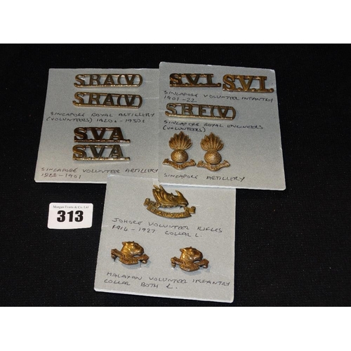 313 - A Group Of Far East Collar Badges & Shoulder Titles