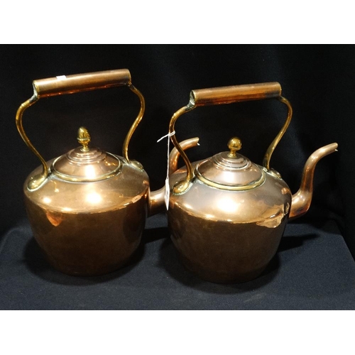 82 - A Near Pair Of Antique Copper Kettles