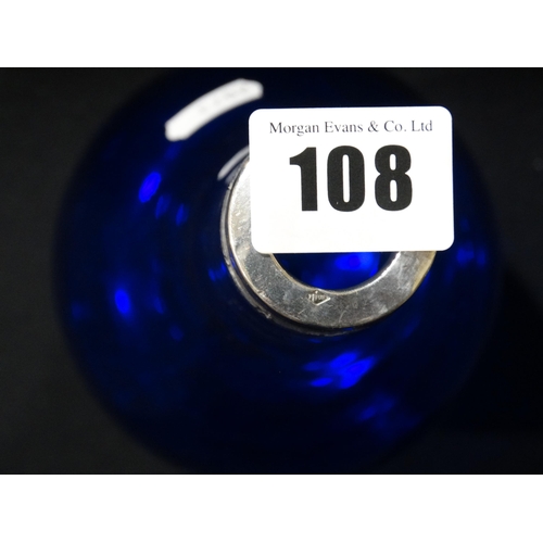 108 - A Circular Based Blue Glass Narrow Necked Bottle With Continental Silver Collar, 11