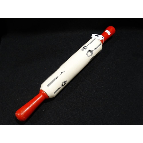 A Mid Century Ceramic Rolling Pin With Transfer Cutlery Pattern
