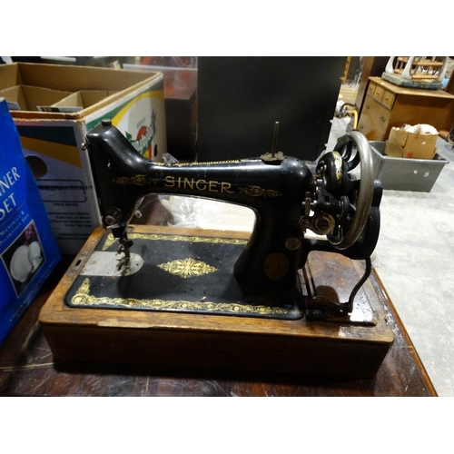 156 - A Cased Singer Sewing Machine