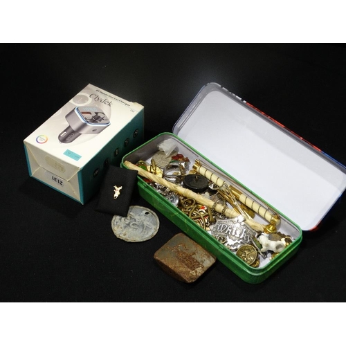 20 - A Small Tin Box Of Collectables, Together With An USB Charger