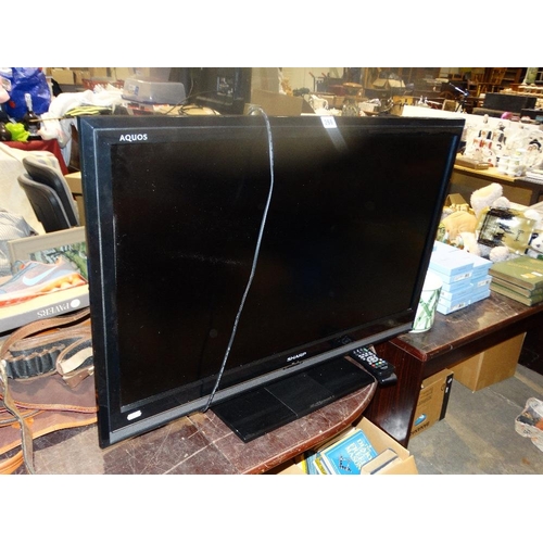 266 - A Sharp Flat Screen TV