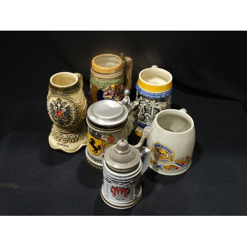 27 - A Group Of Six Stoneware Steins