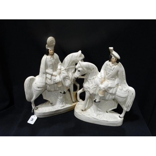 54 - A Pair Of Staffordshire Pottery Equestrian Figures