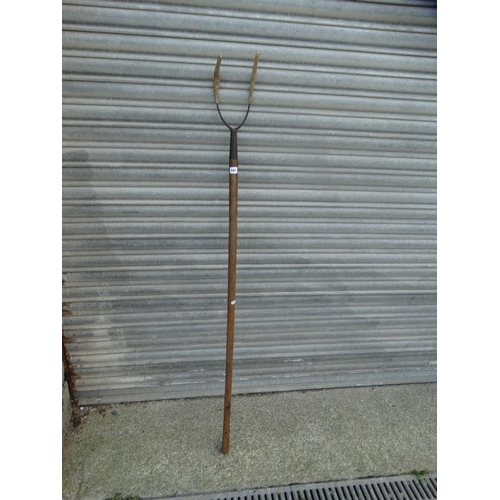 587 - An Antique Wooden Handled Pitch Fork