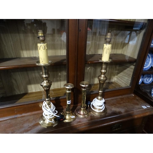 601 - A Pair Of Brass Table Lamps, Together With A Pair Of Arts & Crafts Brass Candle Holders