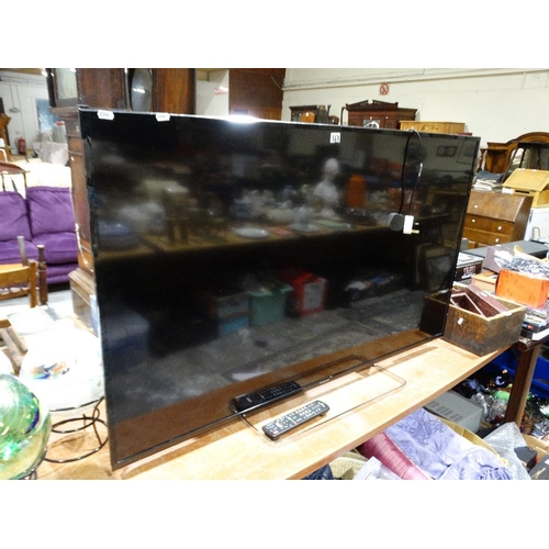 A Panasonic Flat Screen TV & Remote, 55" Screen