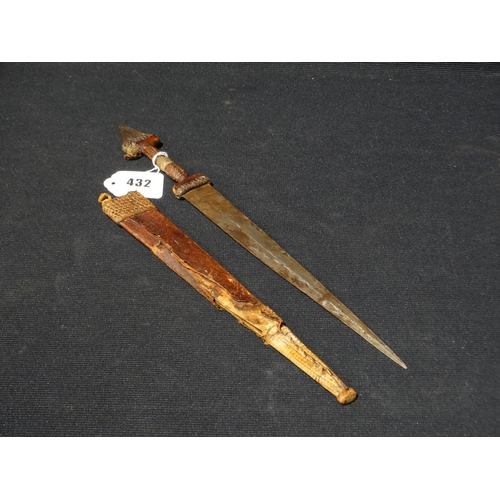 432 - A North African Tribal Dagger In Leather Sheath