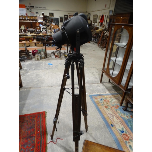 547 - An Industrial Style Theatre Type Lamp On A Tripod Base