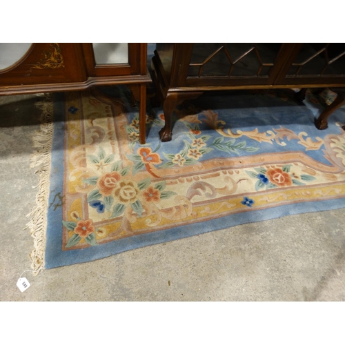 549 - A Blue Ground Floral Decorated Chinese Woollen Carpet, Approx 140 X 104