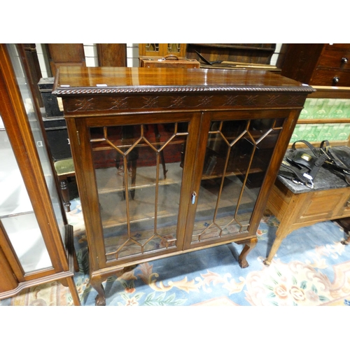 551 - An Edwardian Mahogany Two Door Bookcase Cabinet On Ball & Claw Feet