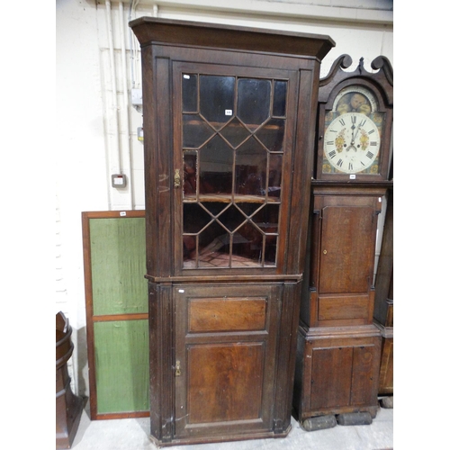 579 - A 19thc Two Piece Standing Corner Cupboard