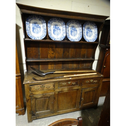 584 - An Antique Oak Welsh Dresser Having A Two Shelf Rack, The Base Having An Arrangement Of Cupboards & ... 