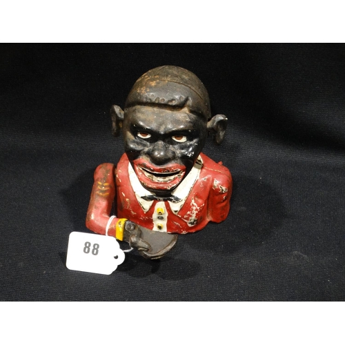 88 - A Cast Iron Jolly Minstrel Money Box