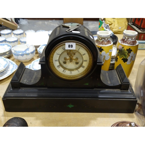 89 - A Victorian Black Marble Mantel Clock With Circular White Dial