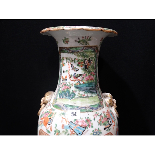 54 - A Large Circular Based Famille Rose Floor Vase With Figural Panels & Moulded Lion Ring Handles, 24