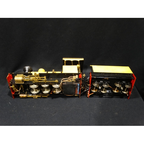 129 - An 0 Gauge Live Steam Model Locomotive & Tender
Model Train