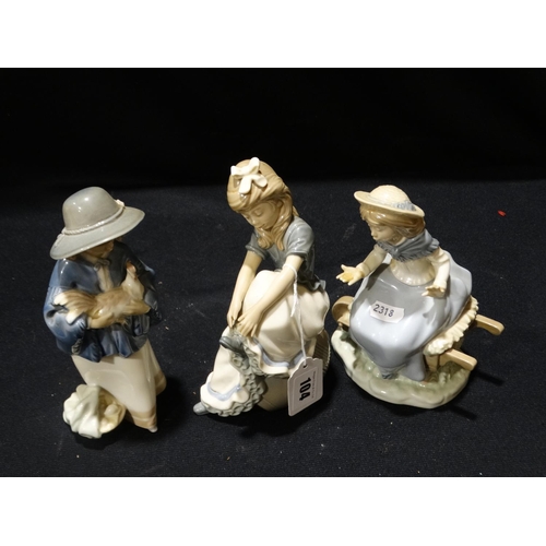 104 - Three Nao Porcelain Figures