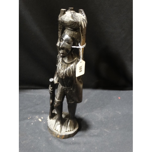 109 - A Carved Native Wooden Figure