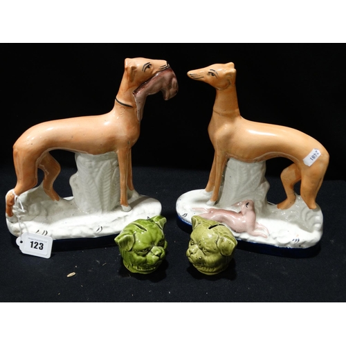 123 - A Pair Of Antique Staffordshire Pottery Greyhounds With Two Money Boxes