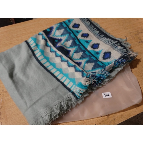 162 - A New And Bagged Woolen Throw