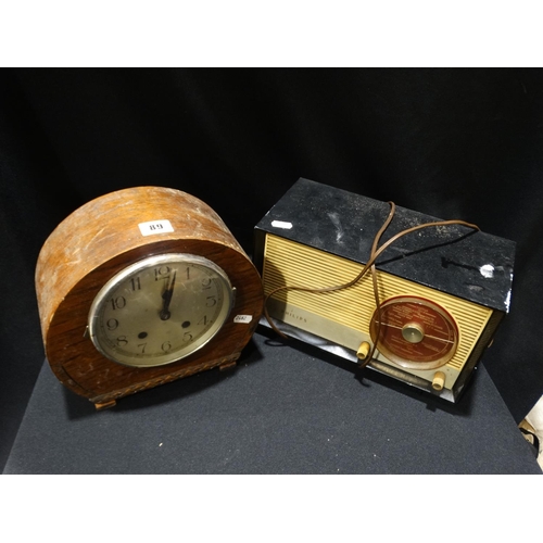 89 - A Vintage Bakelite Radio With A Wood Encased Clock
