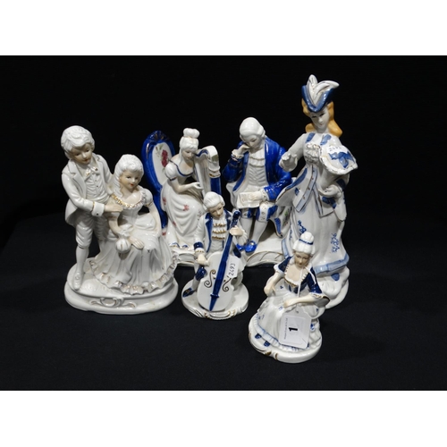 1 - A Group Of Blue & White Ceramic Figurines