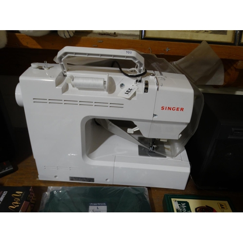 231 - A Singer Electric Sewing Machine