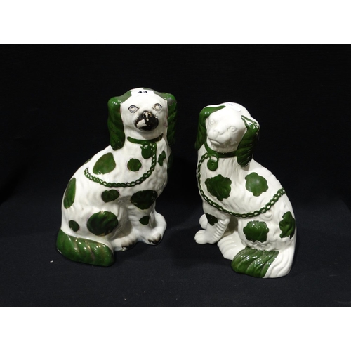 43 - Two Staffordshire Pottery Green & White Seated Dogs