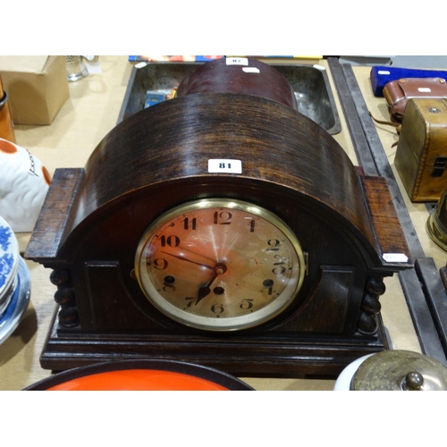 81 - A Polished Oak Encased Mantel Clock