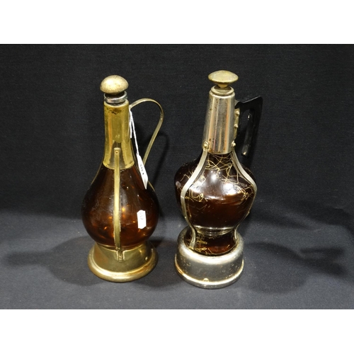 107 - Two Mid Century Coloured Glass Musical Decanters