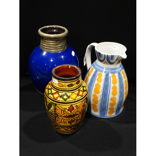 14 - A Buchan Stoneware Milk Jug, Together With Two Pottery Vases