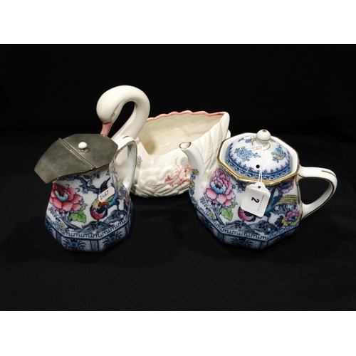 2 - A Losol Ware Teapot & Matching Hot Water Jug, Together With A Pottery Swan