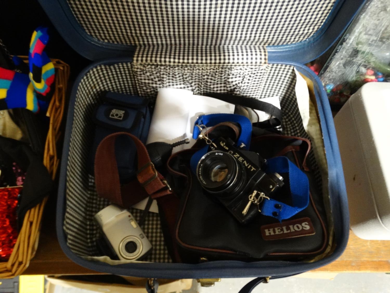 A Case Of Vintage Camera Equipment