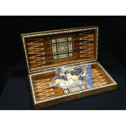 54 - A Boxwood Inlaid Games Box, Together With Contents