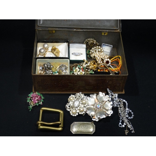 50 - A Tin Box Containing Costume Jewellery